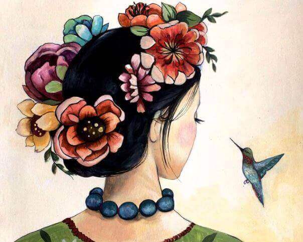 saçlarında çiçekler olan kadın